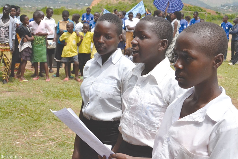 Girls recite a poem during the International Day of the Girl Child celebrations in Kayonza District on Friday. / Stephen Rwembeho.