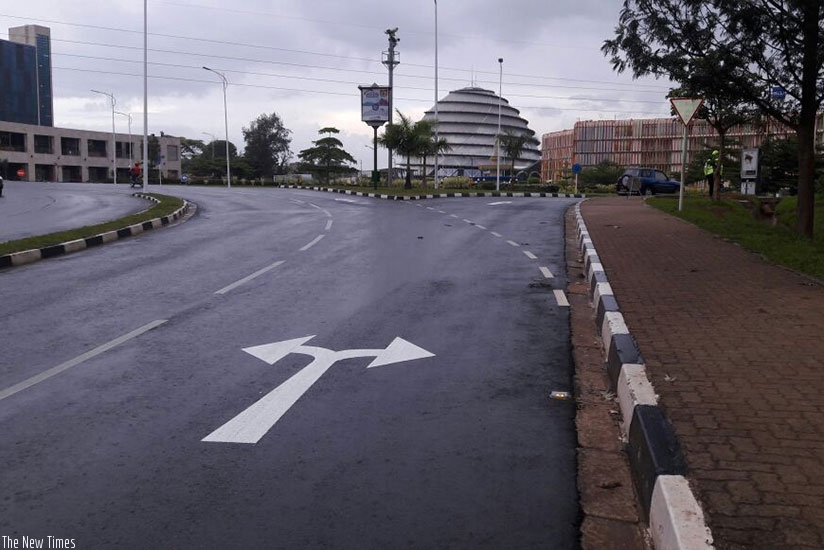A picture of the KBC roundabout showing Kigali Heights (L) and Kigali Convention Centre and Radisson Blu Hotel. The City of Kigali has reopened access to motorists from the city ce....