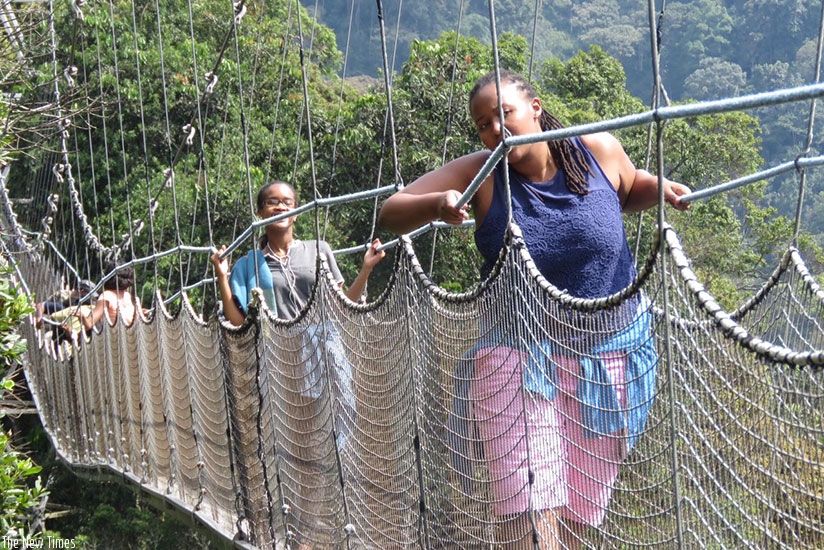 Some of the local tourists on the canopy walk. The walk is one of the most popular attractions among Rwandans. (Dennis Agaba.)