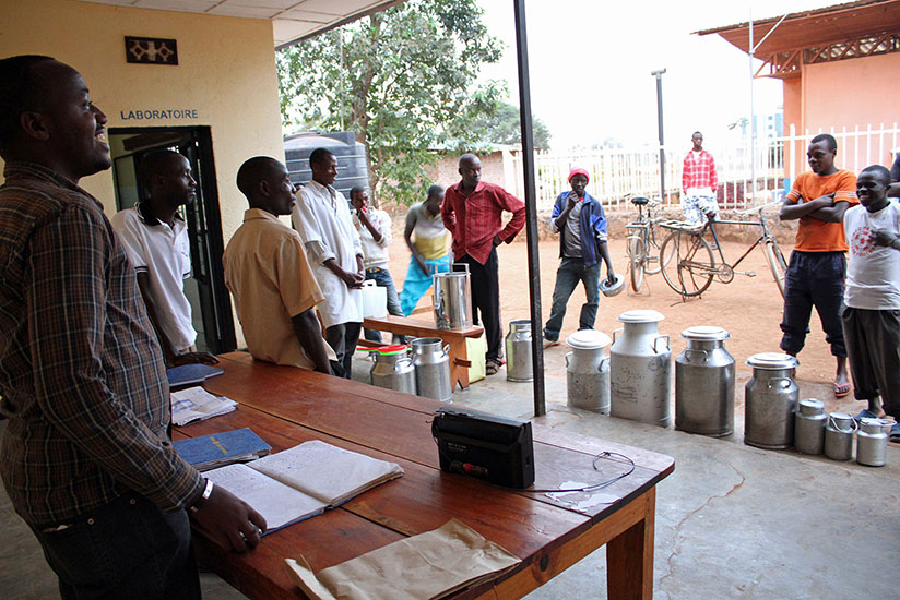 Farmers wait for their milk to be tested at Kigabiro collection centre in Bugesera District. / File