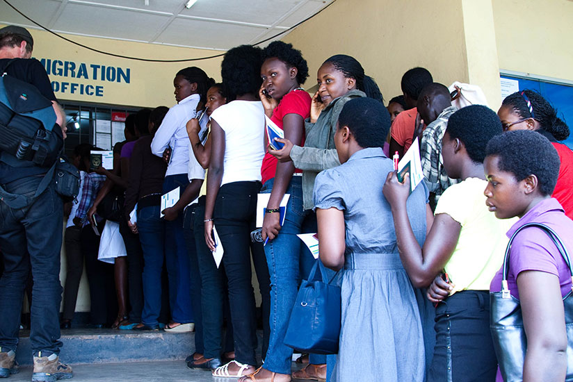 Rwandan students wait to be cleared at Rusumo border between Rwanda and Tanzania. / File