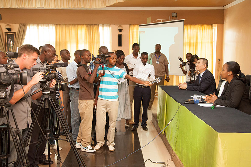 Journalists cover a news conference in Kigali. / Timothy Kisambira