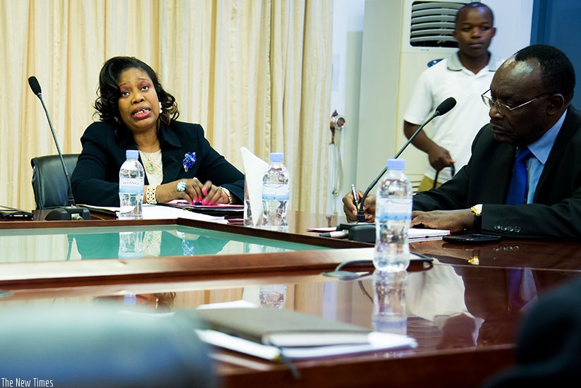 Chantal Therese Mfoula, head of the delegation of the ECCAS officials, speaks as Kanimba takes notes. (Photos by Timothy Kisambira)