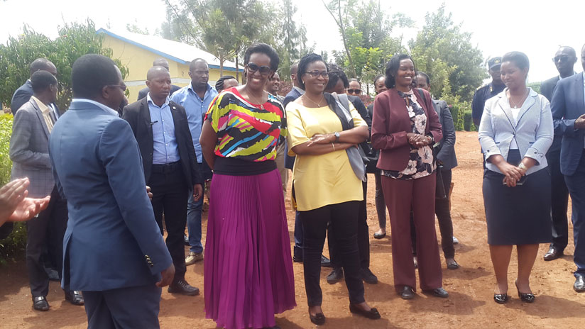 First Ladies Mrs Jeannette Kagame and Mrs Claudine Talon, and other government officials on a tour of the Integrated Development Programme model village in Kayonza District in Eastern Province yesterday. Mrs Kagame and her visiting Benin counterpart Talon have pledged to work together to promote women and childcare in their respective countries. (Courtesy photos)