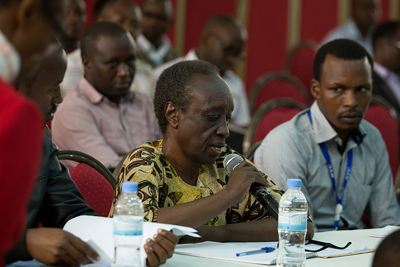 A participant reacts at a question at the workshop on Tuesday. (Photos by T. Kisambira)