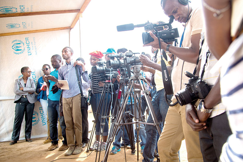Media practioners cover an event at Mahama Refugee Camp in Kirehe District last month. / Faustin Niyigena