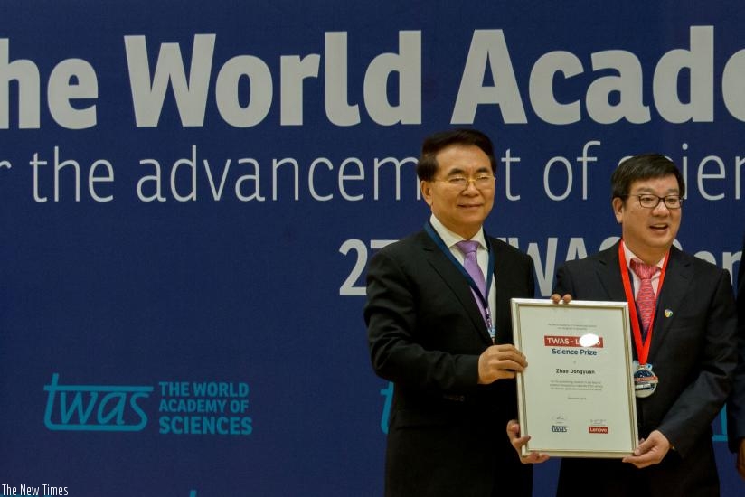 TWAS president Bai Chunli (L) poses for a photo with Zhoa yesterday. (T. Kisambira.)rn