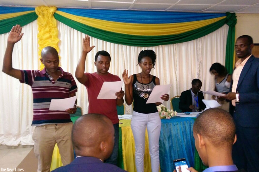 Some of the committee members take oath of office. (Photos: J.Bizimungu.)