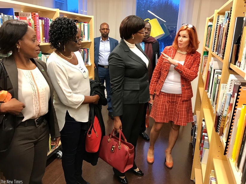 The Director of the Nordic Africa Institute, Ms. Iina Soiri guides Speaker Mukabalisa and her delegation through  northern Europe's largest collection of books on Africa.