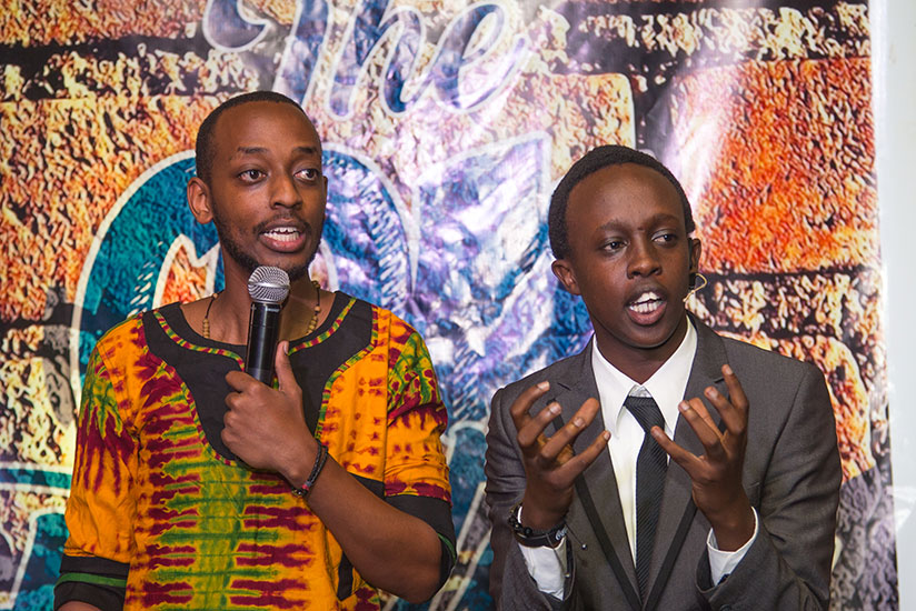 Local comedians, Michael Sengazi and John Muyenzi (R), on stage during the launch of The Com Factory at Galaxy hotel. / Faustin Niyigena