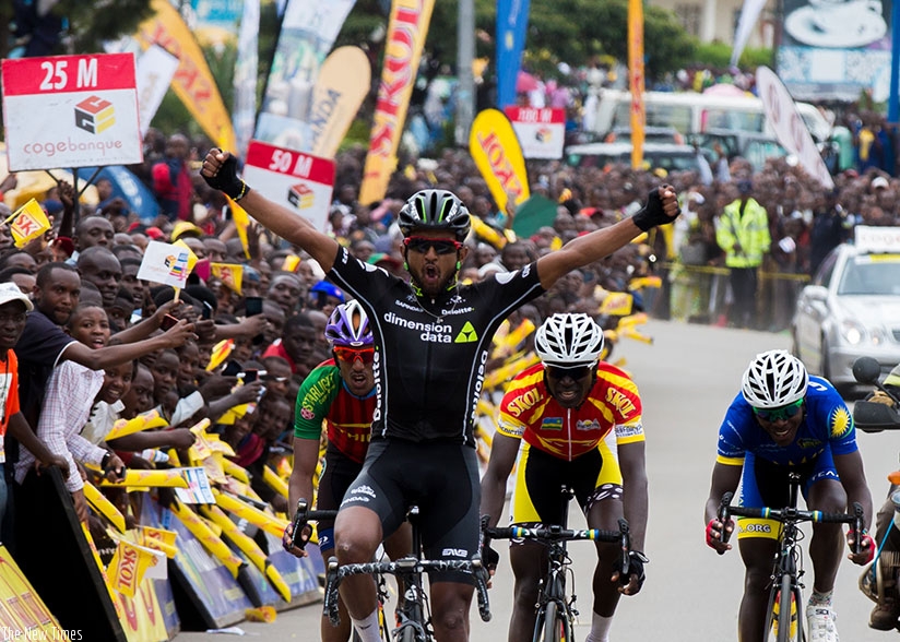 Eritrean Eyob Metkel celebrates after crossing the finish line in stage five of Tour du Rwanda in Musanze town. / Photos by Faustin Niyigena