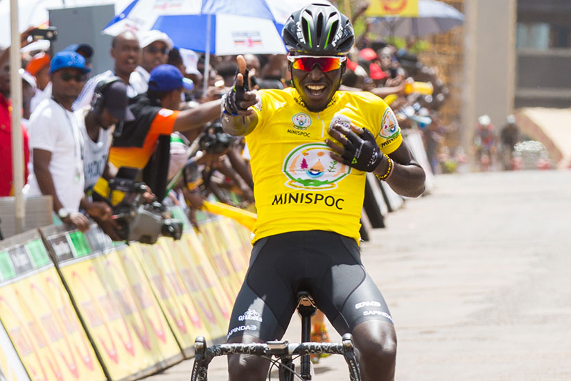 Valens Ndayisenga cheers the public after winning the Tour du Rwanda 2016 on Sunday. / Faustin Niyigena