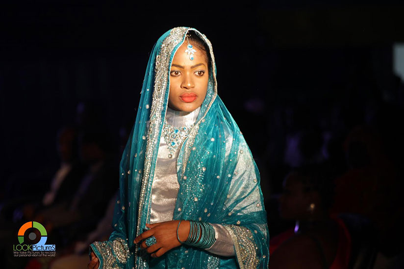 A model wears fashionable traditional Indian attire - one of the designs showcased at the Saturday fashion show. / Courtesy