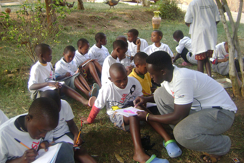 A student volunteering at a charity home. The choice of where to intern should be in line with your career options. / Dennis Agaba