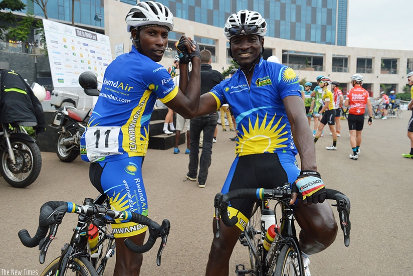 Nathan Byukusenge (L) and Abraham Ruhumuriza (R) retired from cycling after the just-concluded 2016 Tour du Rwanda. / Sam Ngendahimana