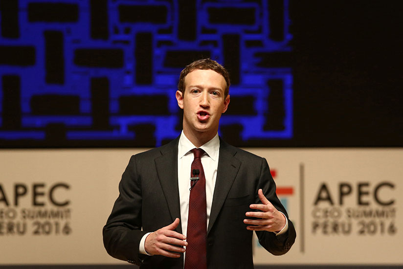 Facebook founder Mark Zuckerberg addresses the audience during a meeting of the APEC (Asia-Pacific Economic Cooperation) CEO Summit in Lima, Peru on November 19. / Internet photo