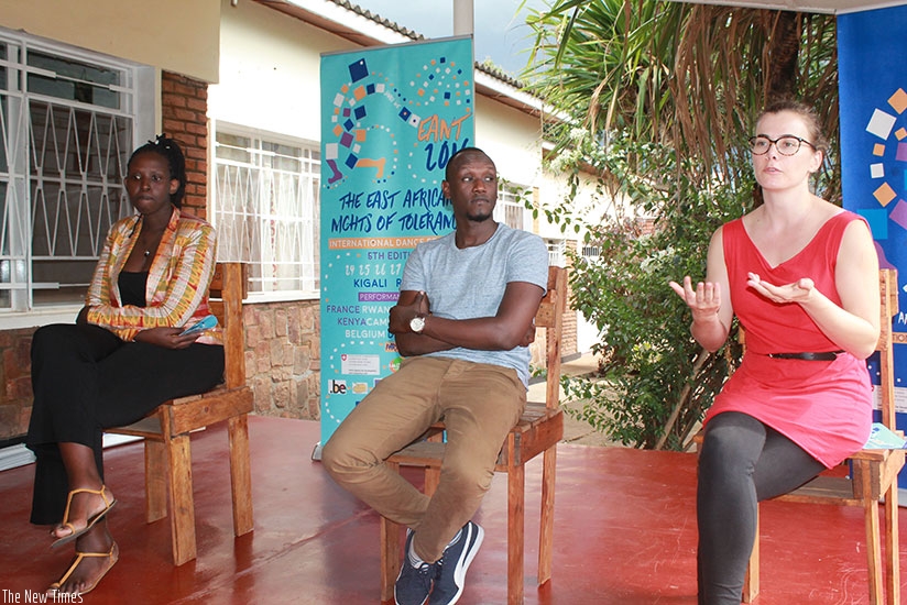 Ariane Nina Zaytzeff (R), the festival producer explains a point at a news conference yesterday. Centre is Wesley Ruzibiza, the festival curator and, left,Natacha Muzira, the communication officer. (Moses Opobo)