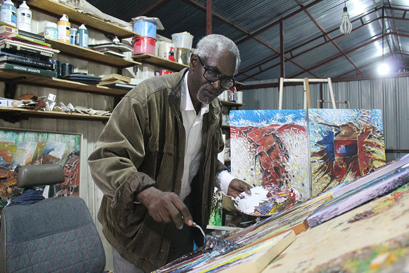 Binamungu earns his daily bread inside the art studio. / Moses Opobo