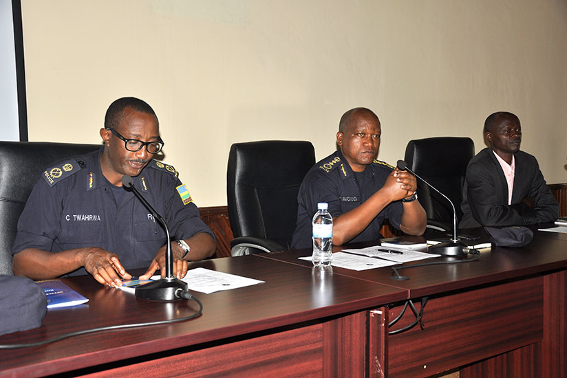 ACP Celestin Twahirwa, DIGP Juvenal Marizamunda (C) and the coordinator of Rwanda Youth Volunteers in Community Policing, Justus Kangwagye during the meeting. / Courtesy