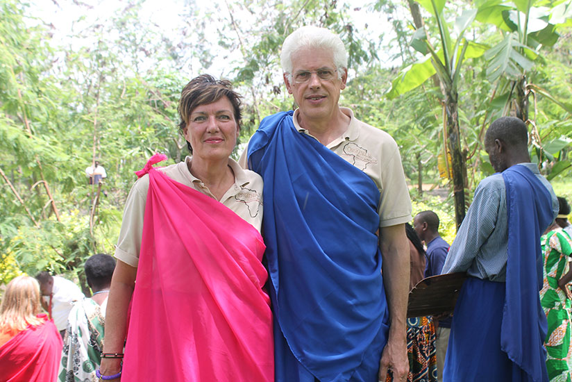 Eric Van Stapele and his wife clad in umushanana. / Moses Opobo