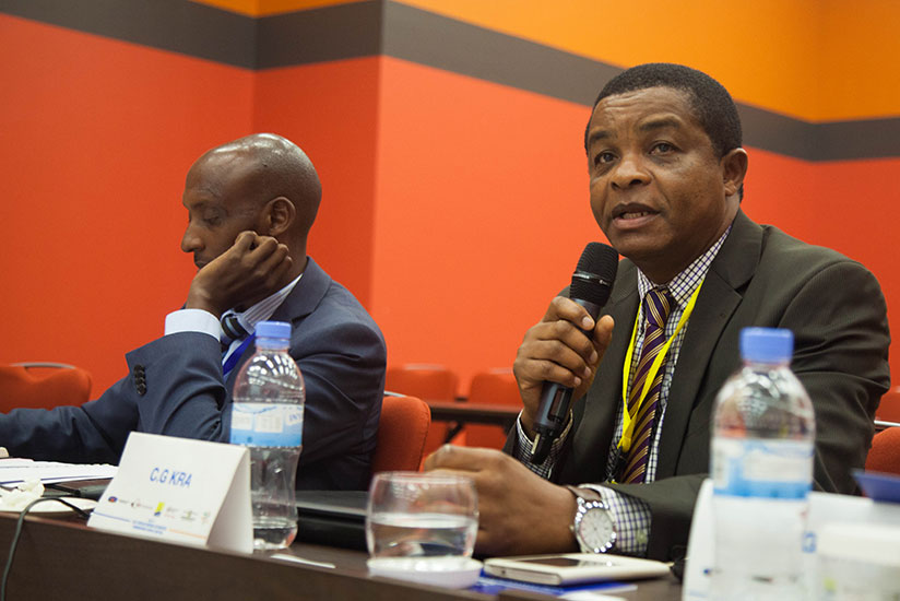 Njiraini speaks during the meeting as Tusabe listens. / Nadege Imbabazi