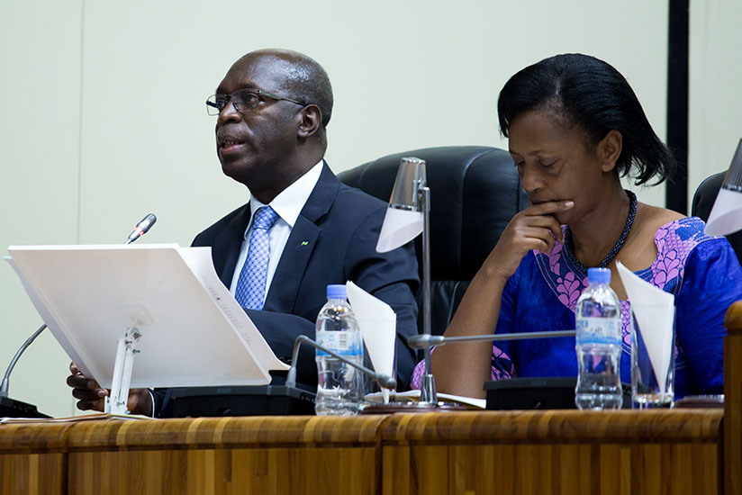 Prime Minister Anastase Murekezi addresses lawmakers as Senate vice-president Jeanne d'Arc Gakuba looks on yesterday. / Timothy Kisambira