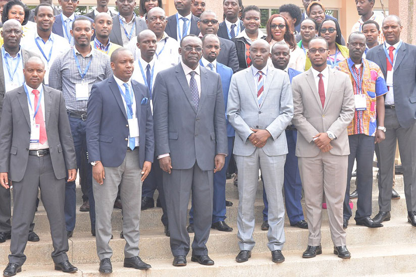 Kanimba (centre) poses for a photo with some of the workshop participants. / Frederic Byumvuhore