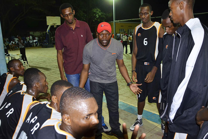 APR BBC coach Cliff Owuor gives instructions to his players at Cercle Sportif in last season's play off. / Sam Ngendahimana