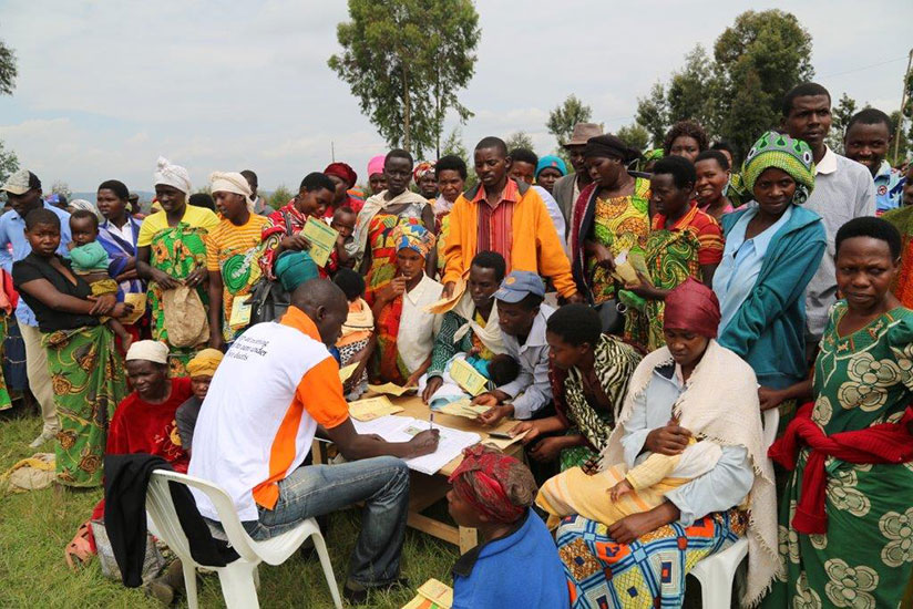  Parents lining up to register their children during a recentrnchild birth registration campaign in Gichumbi District.