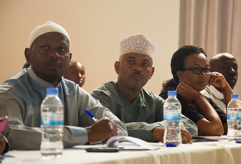 Participants follow proceedings during the meeting yesterday. (Nadege Imbabazi)