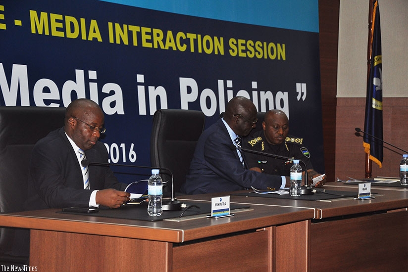 Justice minister Johnston Busingye (C), State Minister for Transport Alexis Nzahabwanimana (L) and IGP Emmanuel K. Gasana (R) during the RNP-Media interaction session yesterday. (Courtesy)