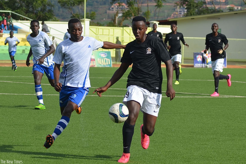Innocent Nshuti, (R) scored APRu2019s first goal in the 2-0 win over Pepiniere. (Sam Ngendahimana)