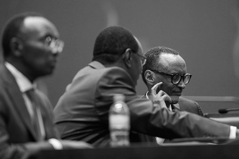 President Paul Kagame chats with Senate president Bernard Makuza on Day II of the annual Umushyikirano yesterday. / Village Urugwiro