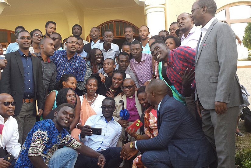 Bishop Rucyahana and his wife (both centre) in a group photo with the school's alumni. / Eddie Nsabimana