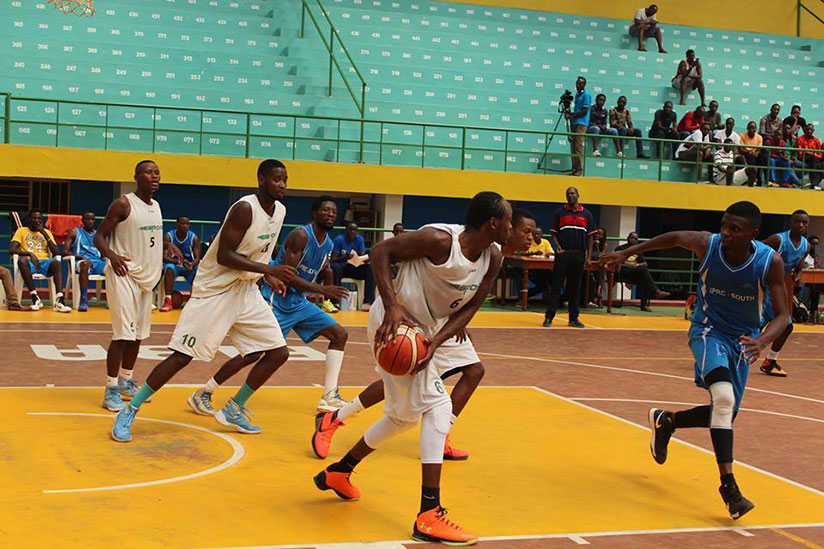 IPRC-South (Blue) were humiliated by Espoir (White) during their league fixture last Saturday at Amahoro indoor stadium. / Geoffrey Asiimwe