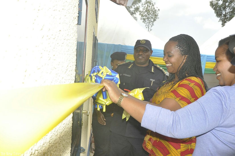 Minister Nyirasafari and IGP Gasana at the inauguration ceremony of the houses in Kayonza yesterday. (Courtesy)