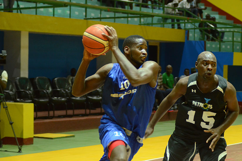 Olivier Shyaka, left, was Espoir's top scorer dropping 12 points while Junior Ambol, right, dropped a game-high 19 points for Patriots. / Sam Ngendahimana
