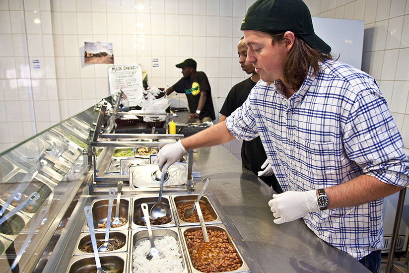 A chef serves food at Meze Fresh Restraurant. / Courtesy