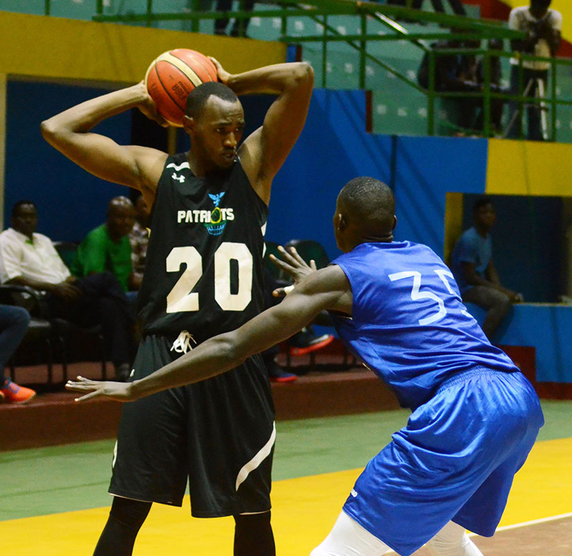 Patriots Power foward Sanny Niyomugabo, left, is part of the provisional 18-player team that will start training on Tuesday. / Sam Ngendahimana