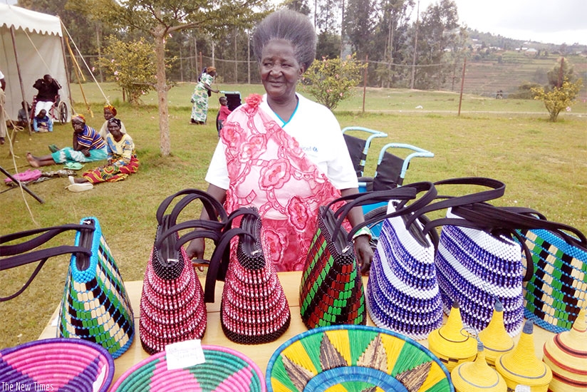 Mukanyindo displays some of the group's products at a recent exhibition in Nyamagabe.  (Photos by Appolonia Uwanziga)
