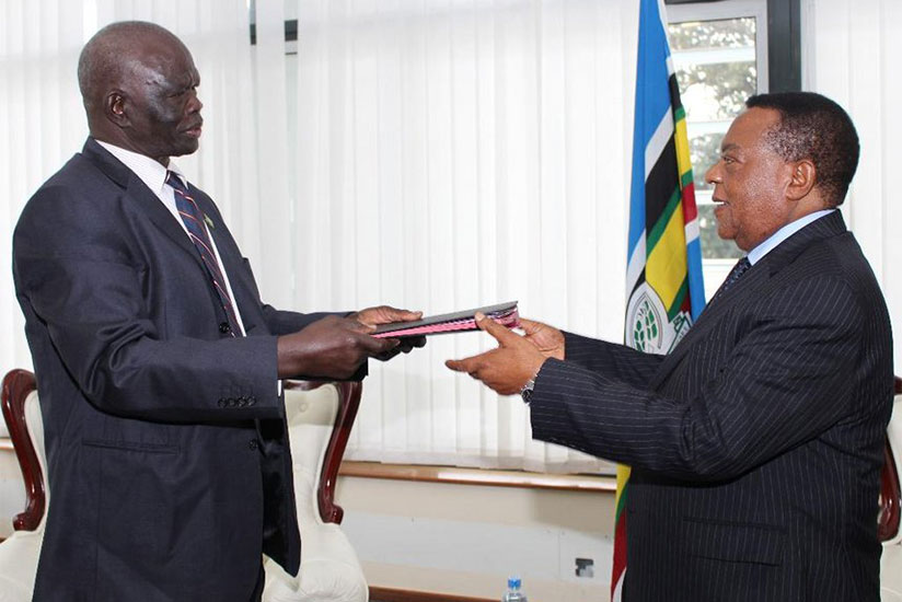 Chair of the EAC Council of Ministers Augustine Mahiga receives document of instrument of ratification from Aggrey Tisa SabunI of South Sudan in Arusha, last year. / Internet photo