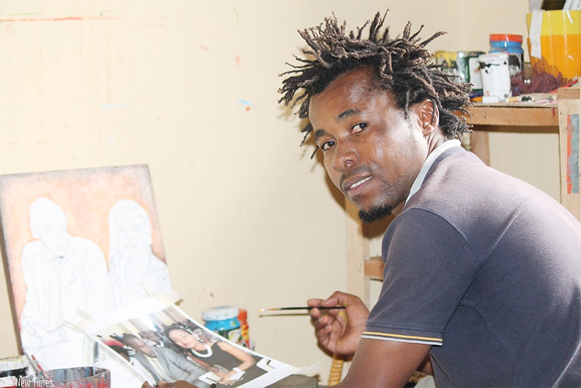 Olivier Kwitonda works on a portrait at his new location in Kacyiru. Photo by Moses Opobo