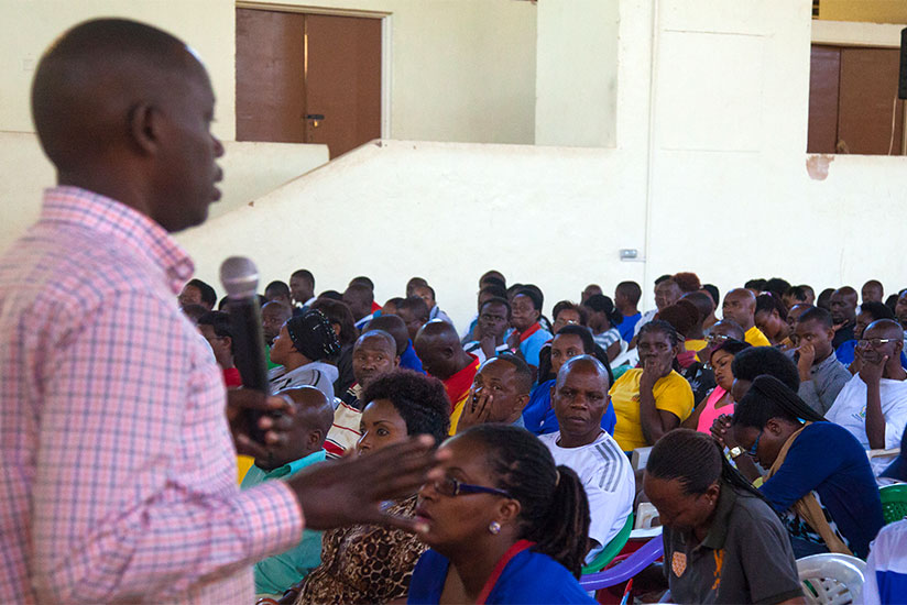 Charles Havuguziga, the executive secretary of Nyarugenge Sector in Nyarugenge District, Kigali, speaks to teachers during Itorero. More than 73,000 teachers from nursery, primary,....