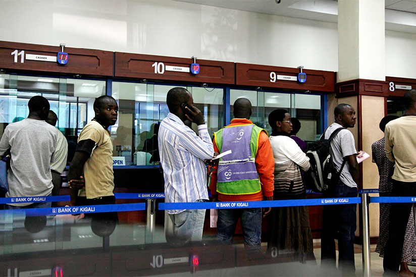 Bank of Kigali clients queue to get served. / File
