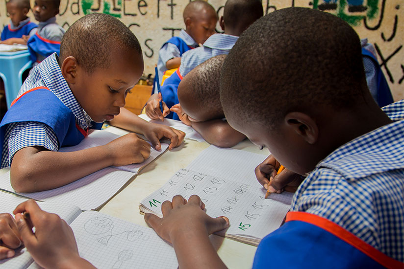 Nursery pupils working on their assignment at Aspire Rwanda Foundation in Gisozi, Kigali. / Faustin Niyigena