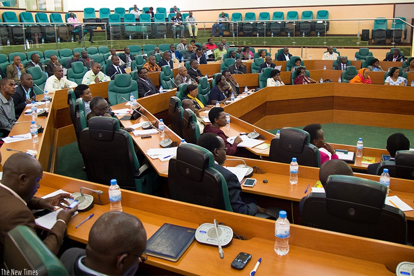 Senators follow proceedings during a session. (Timothy Kisambira)