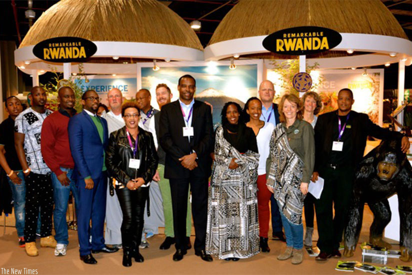 Officials and some exhibitors at the Rwandan stall in a group photo. / Courtesy
