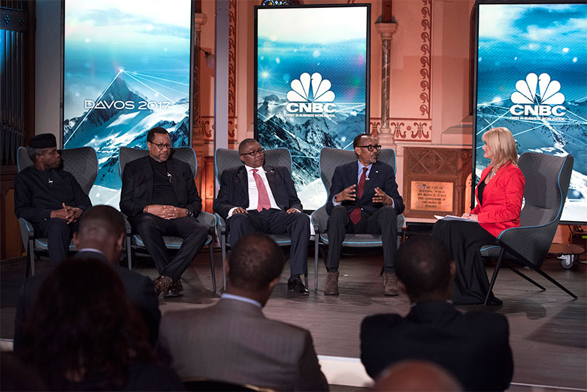 President Kagame in a panel discussion with, from left to right, Oluyemi Osinbajo,  vice-president of Nigeria; Phuthuma Nhleko, executive chairman, MTN Group; and Siyabonga Gama of....