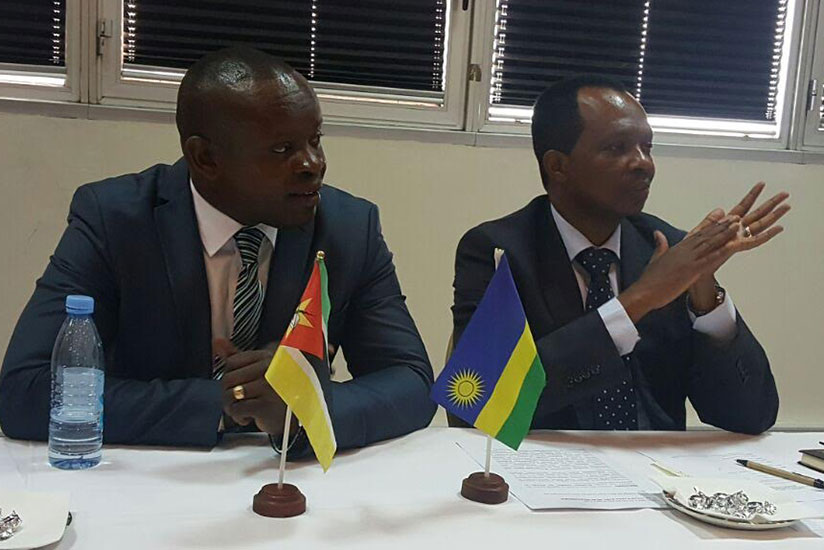  Karega (R) with Louis Baziga, of the Rwandan Community in Mozambique. (Courtesy)