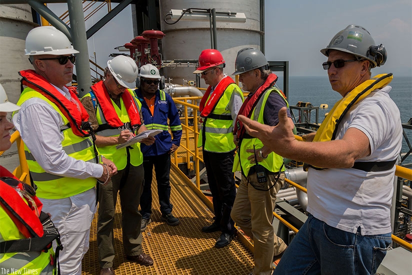ContourGlobal engineers inspect KivuWatt Methane Gas plant installations on Lake Kivu last year. Rwanda will begin search for petroleum on the lake in March.  File